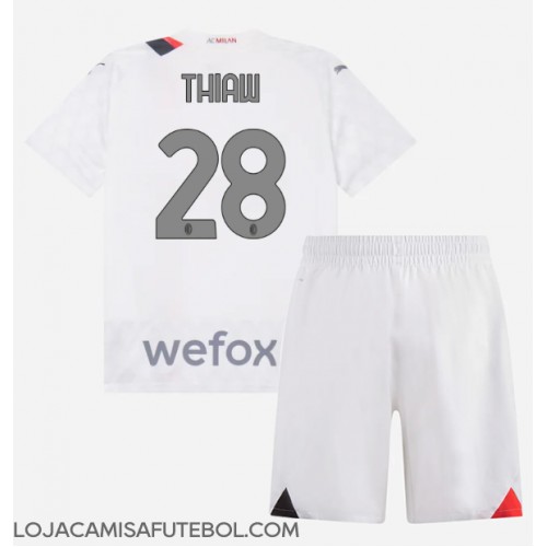 Camisa de Futebol AC Milan Malick Thiaw #28 Equipamento Secundário Infantil 2023-24 Manga Curta (+ Calças curtas)